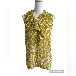 Loft sleeveless mustard and white geometric design blouse with ruffle jabot.